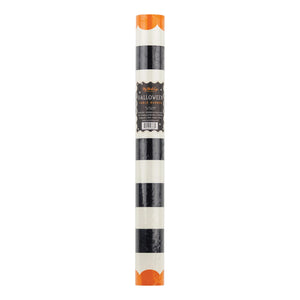 Paper table runner roll of black and white stripeds with orange ends 