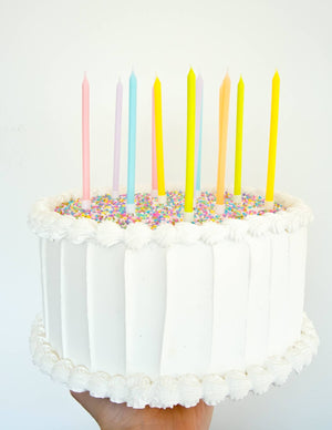 Pastel Rainbow Candles 12ct. on cake