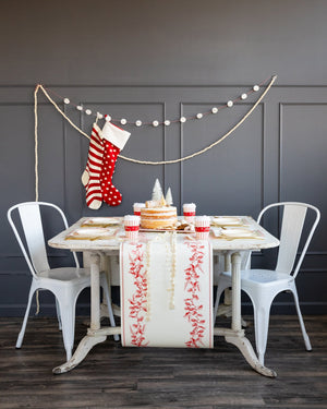 Cream & Red Holly Paper Table Runner table setting