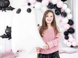 girl holding a cute ghost balloon