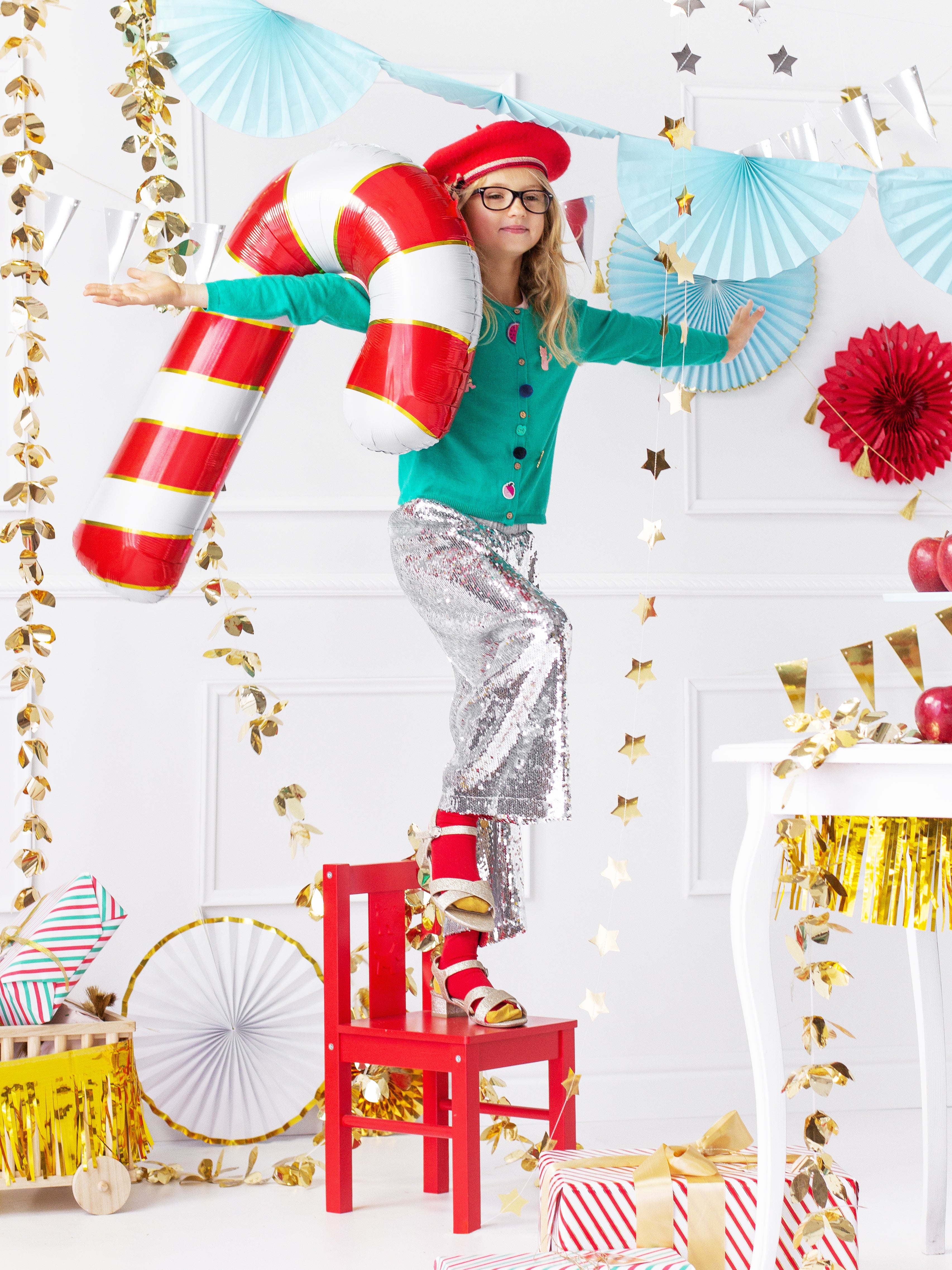 red and gold candy cane balloon