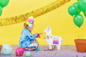 Girl with Llama Piñata