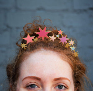girl wearing ROSE-HEADBAND-STAR